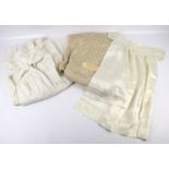 A collection of four early 20th century items of clothing.
