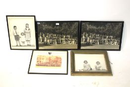 A collection of mid to late 20th century framed photographs.