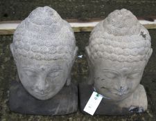 Garden feature - two contemporary reconstituted stone Buddha's heads.