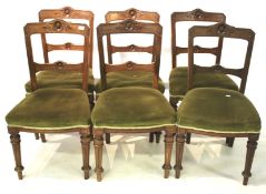 Six Edwardian mahogany dining chairs.