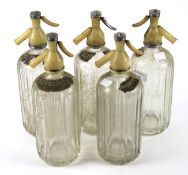 Five vintage Schwepps glass bottle soda syphons.