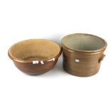 Two terracotta garden circular plant pots.