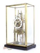 A mid-20th century contemporary Gothic skeleton clock. The fusee movement with 13.