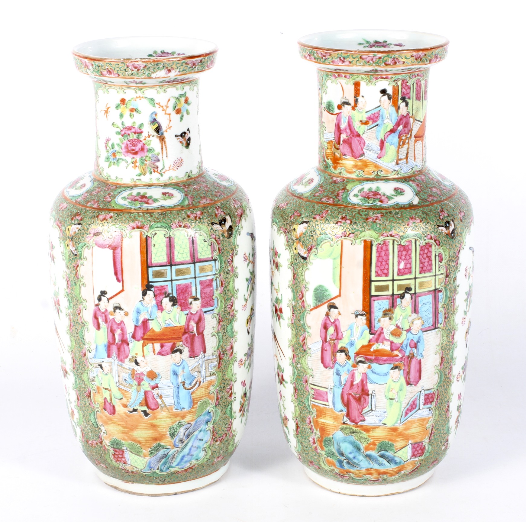 A pair of 19th century Canton famille rose rouleau shaped vases.