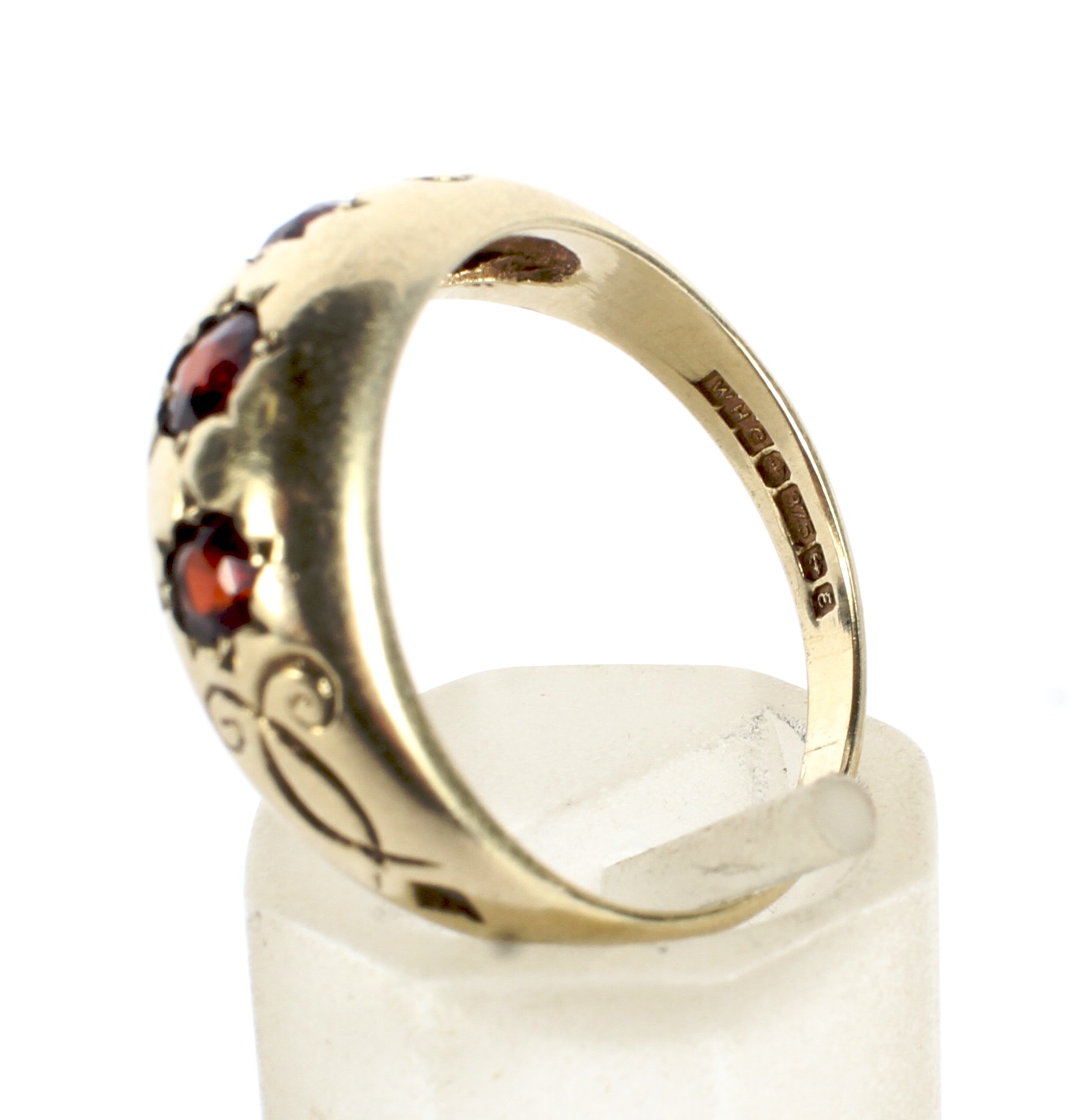 A vintage 9ct gold and garnet three stone gypsy ring. - Image 4 of 4