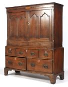 A Georgian oak cupboard on chest.