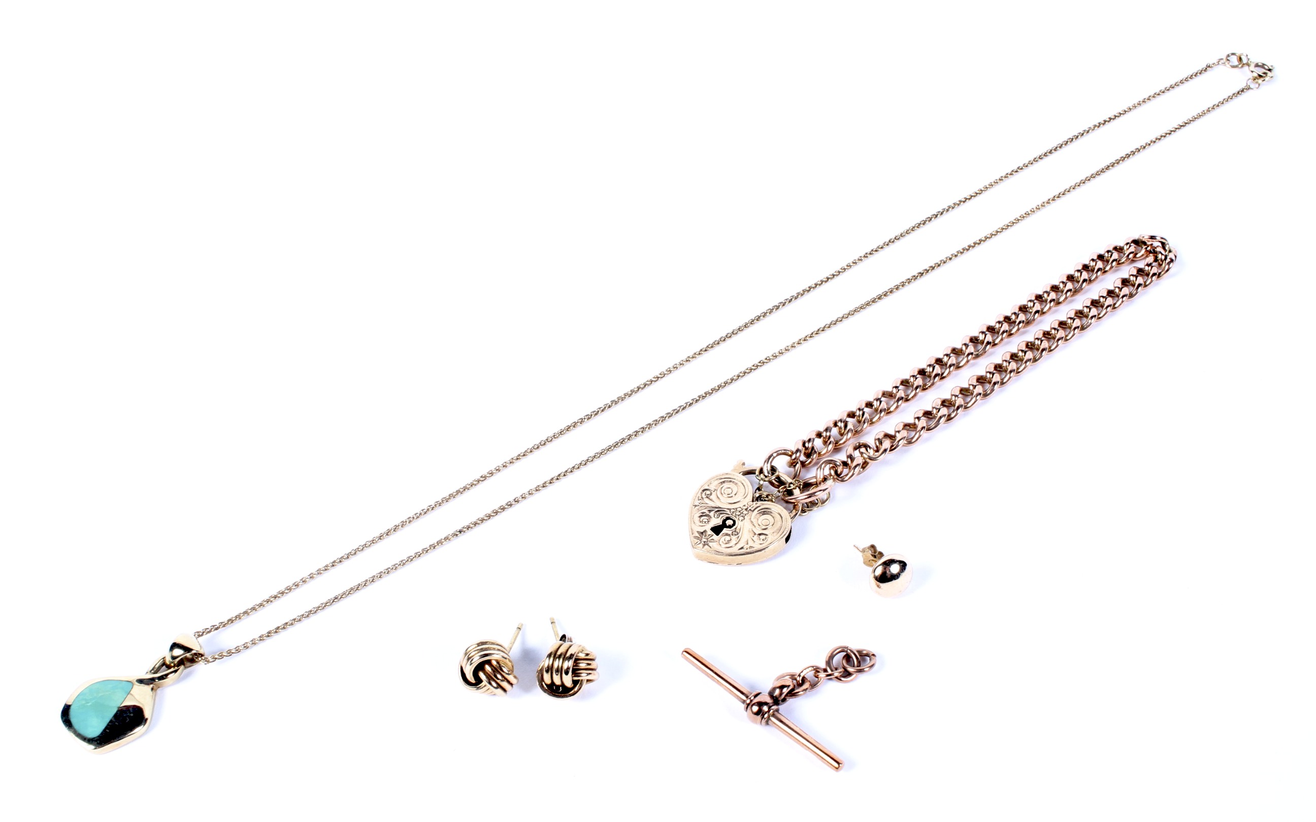 A 9ct rose gold curb bracelet and a small collection of jewellery.