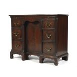 A Georgian style mahogany kneehole desk.