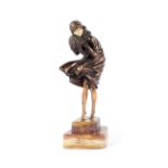 An Art Deco style bronzed figure titled 'The Squall', after Demetre Chiparus (1888-1950).
