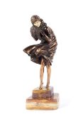 An Art Deco style bronzed figure titled 'The Squall', after Demetre Chiparus (1888-1950).