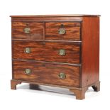 A Georgian mahogany chest of drawers.