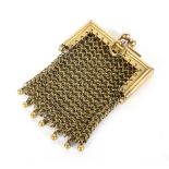 An early 20th century gold mesh sovereign or miser's purse.