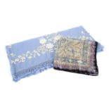 A vintage Liberty of London silk paisley pattern scarf and a pale blue embroidered shawl.