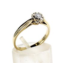 A modern 9ct gold and diamond solitaire ring.