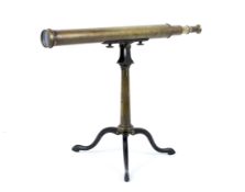 A 19th century brass three drawer telescope on tripod stand.