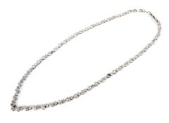 A modern diamond necklace.
