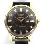 A vintage Longines conquest automatic gents wristwatch.