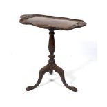 A late Victorian mahogany tilt-top tripod tea table.
