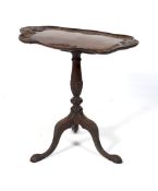A late Victorian mahogany tilt-top tripod tea table.