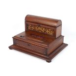 A Victorian rosewood and mahogany writing box.