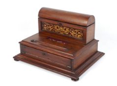 A Victorian rosewood and mahogany writing box.