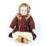 An early 20th century Simon & Halbig bisque headed doll.