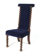 A Victorian rosewood barley twist prayer chair.