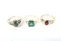 Three gem set dress rings.