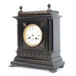 A Victorian ebonised cased 8-day mantle clock.