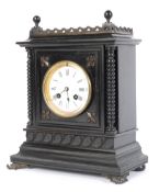 A Victorian ebonised cased 8-day mantle clock.