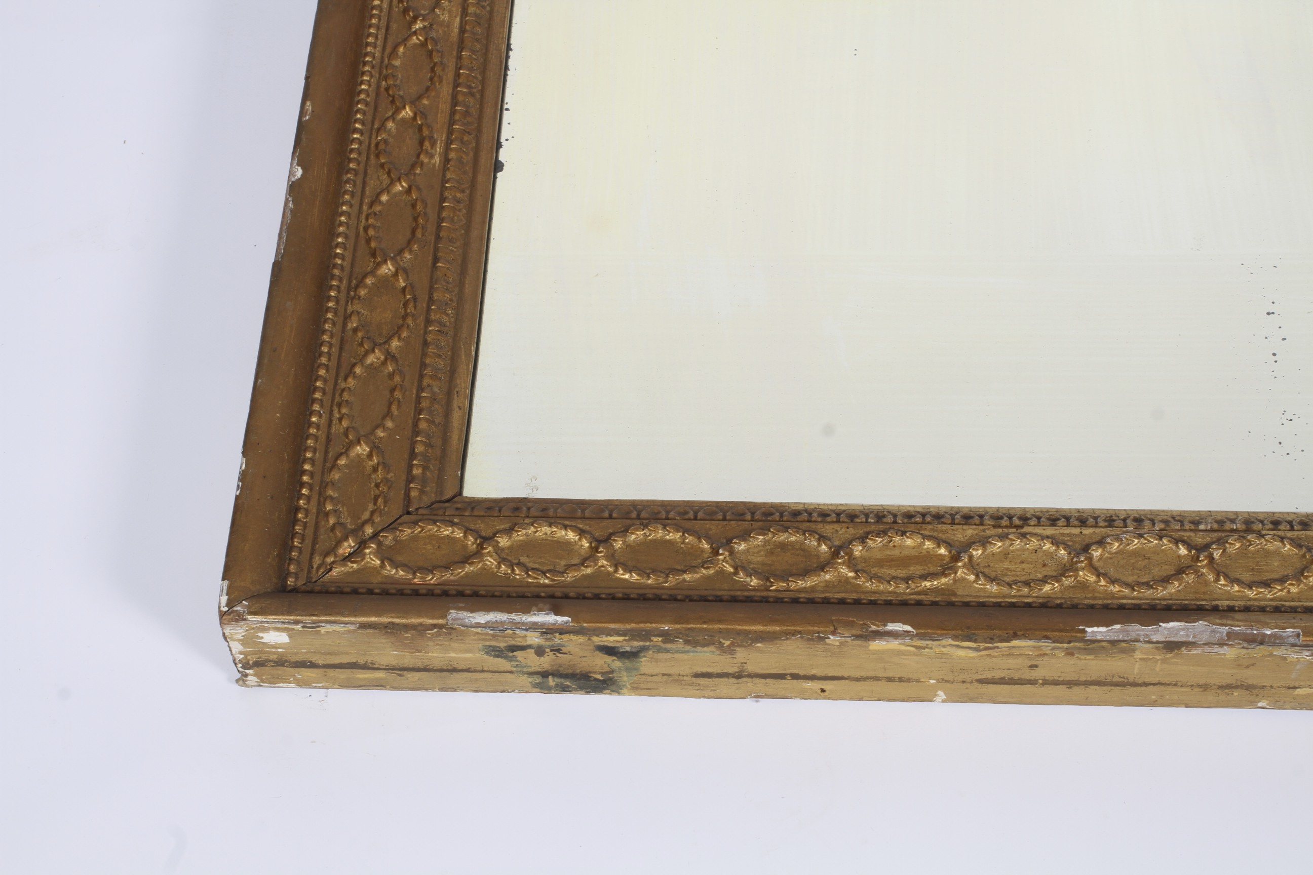 A 19th century large decorative gilt plaster and wood overmantel wall mirror. - Image 2 of 2