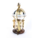 A St James House Meridian world globe table clock, with 8-day movement made in 1984,