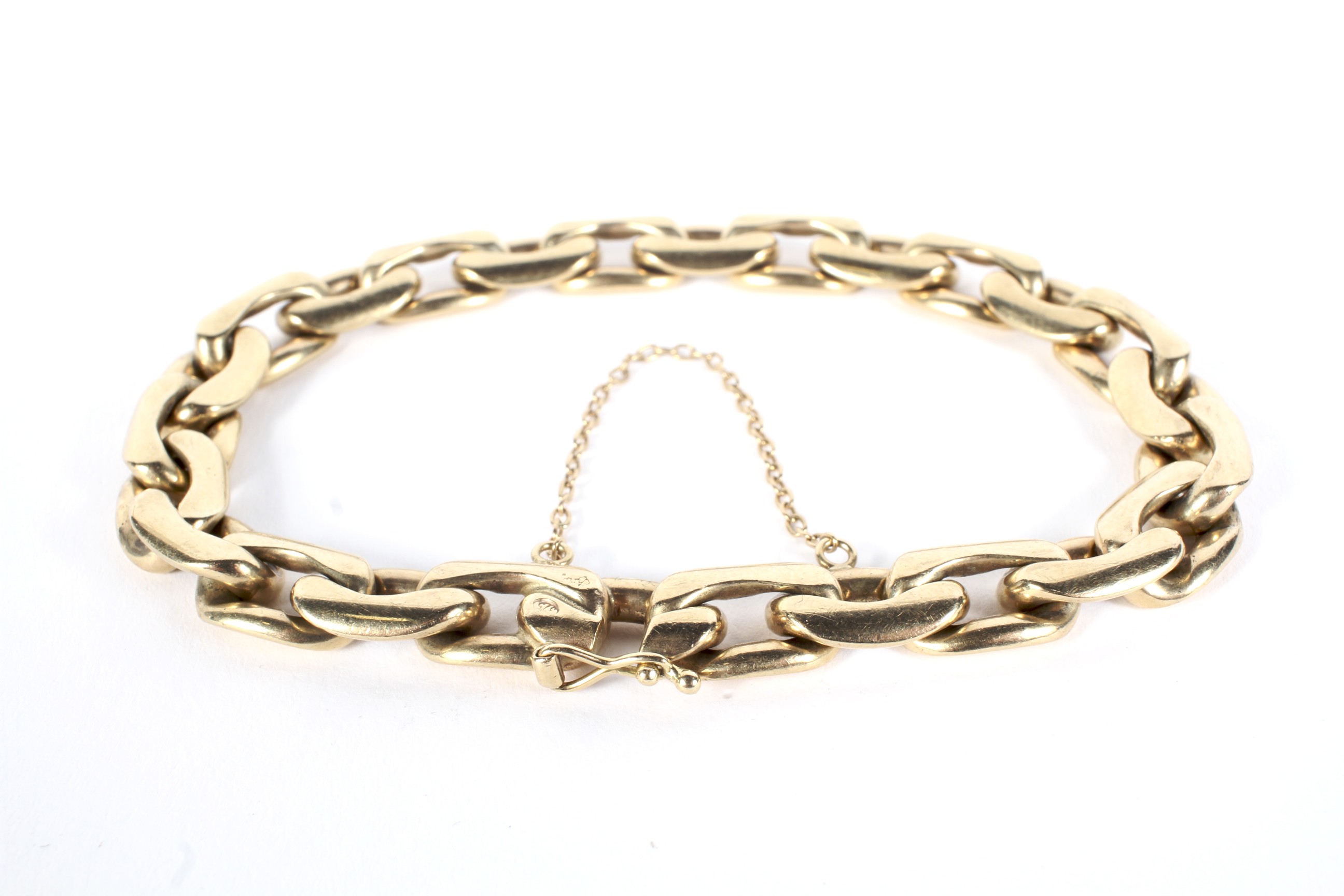 A vintage fancy link bracelet stamped '375'.