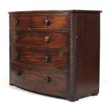 A 19th century mahogany bow fronted chest of drawers.