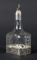 An early 20th century continental silver mounted glass flaggon with etched decoration.