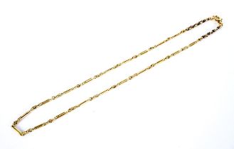 An early 20th century gold fetter and rope-link fancy necklace.