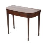 An Edwardian inlaid mahogany D-end folding card table.