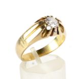 An early to mid-20th century gold and diamond single stone gypsy ring.