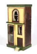 An early 20th century painted wooden dolls town house and contents.