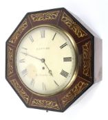 A Regency brass inlaid octagonal mahogany 36-hour wall clock.