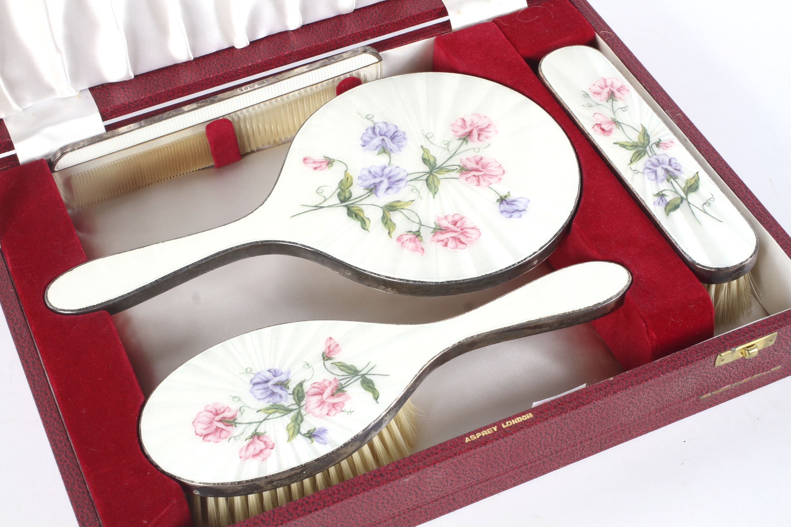 A four-piece silver and enamel dressing table set retailed by Asprey, London. - Image 2 of 3