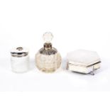 Three assorted ladies silver dressing table accessories, including a scent bottle,