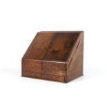 A Victorian walnut stationary writing box.