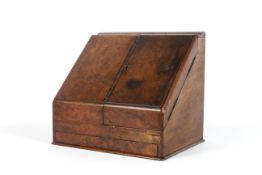 A Victorian walnut stationary writing box.