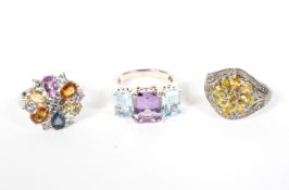 Three multi-gem rings.
