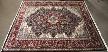 A large persian room sized rug with central medalion within a medalion on a black ground.