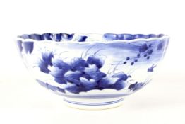 A Japanese style blue and white porcelain fluted punch bowl.