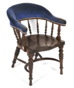A mid-20th century spindle back bow library chair.