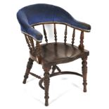 A mid-20th century spindle back bow library chair.