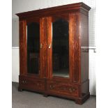 A fine 19th century inlaid mahogany double gentleman's wardrobe.